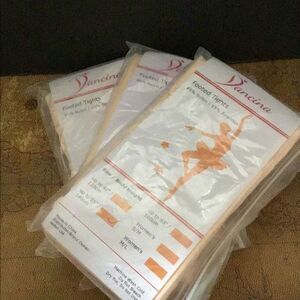 Footed tights by Dancina Three packs two pair each Please look at the size I don